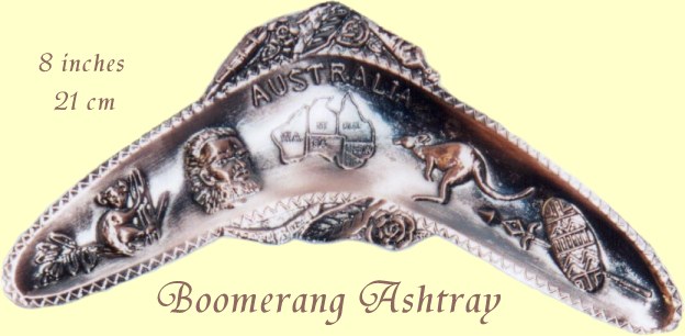 Boomerang shaped brass ashtray with Australian motifs