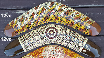 Dot painting on boomerangs, 12in
